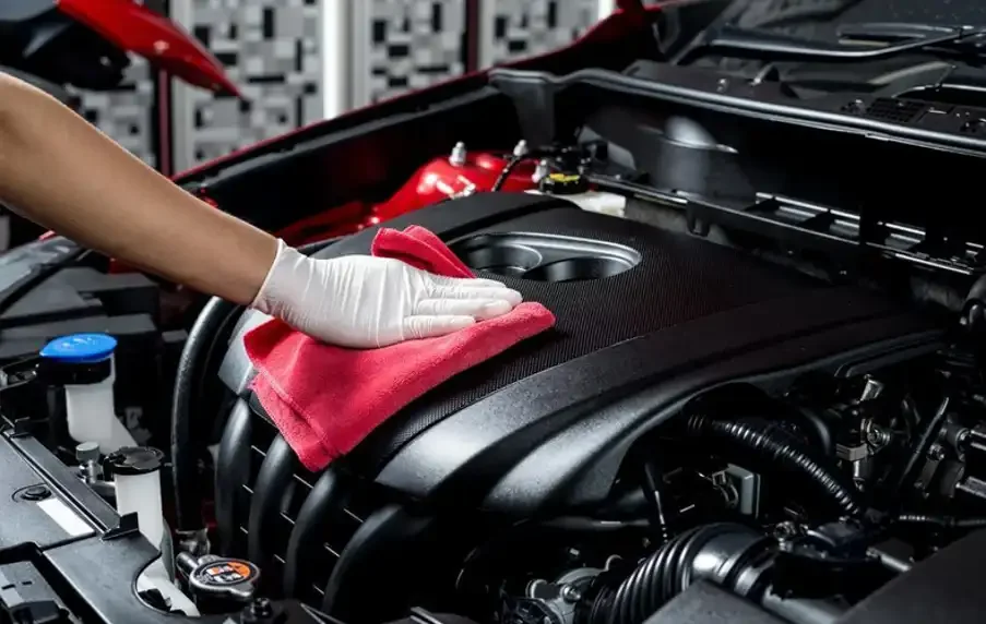 Using engine cleaner spray
