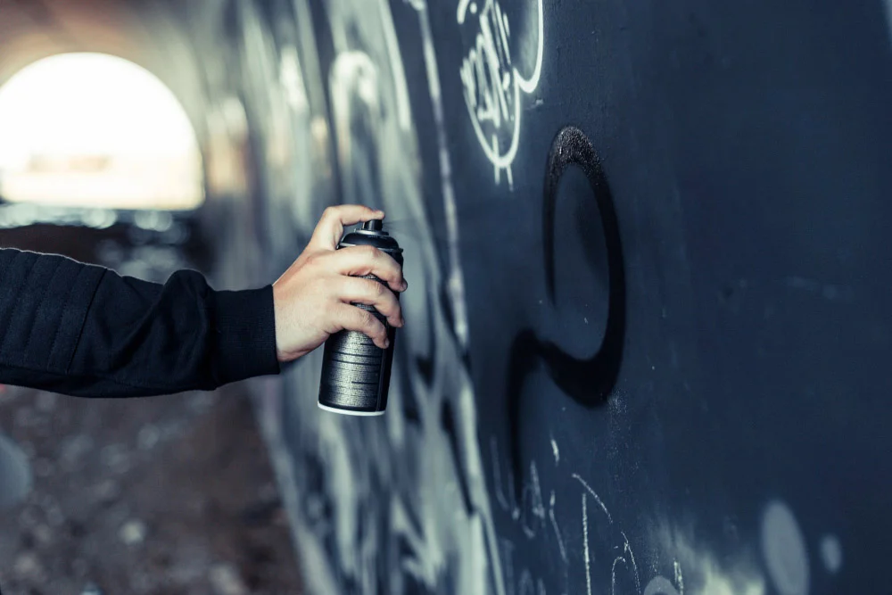 Removing spray paint from a wall